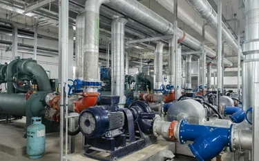 Pump and chiller plant equipment in a utility room