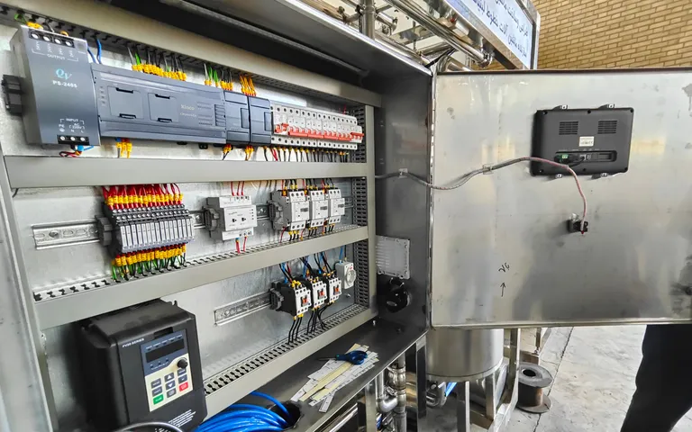 Controller and drive sharing a cabinet with breakers and contactors