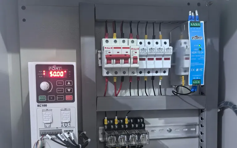 Drive and circuit breakers mounted in a pump control cabinet