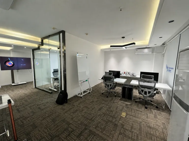 Meeting area and desks in the Bangkok office